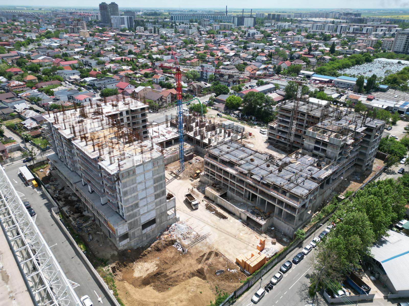 Aerial view of the Venus Arena Residence construction site in Bucharest, with several buildings under way and tower cranes